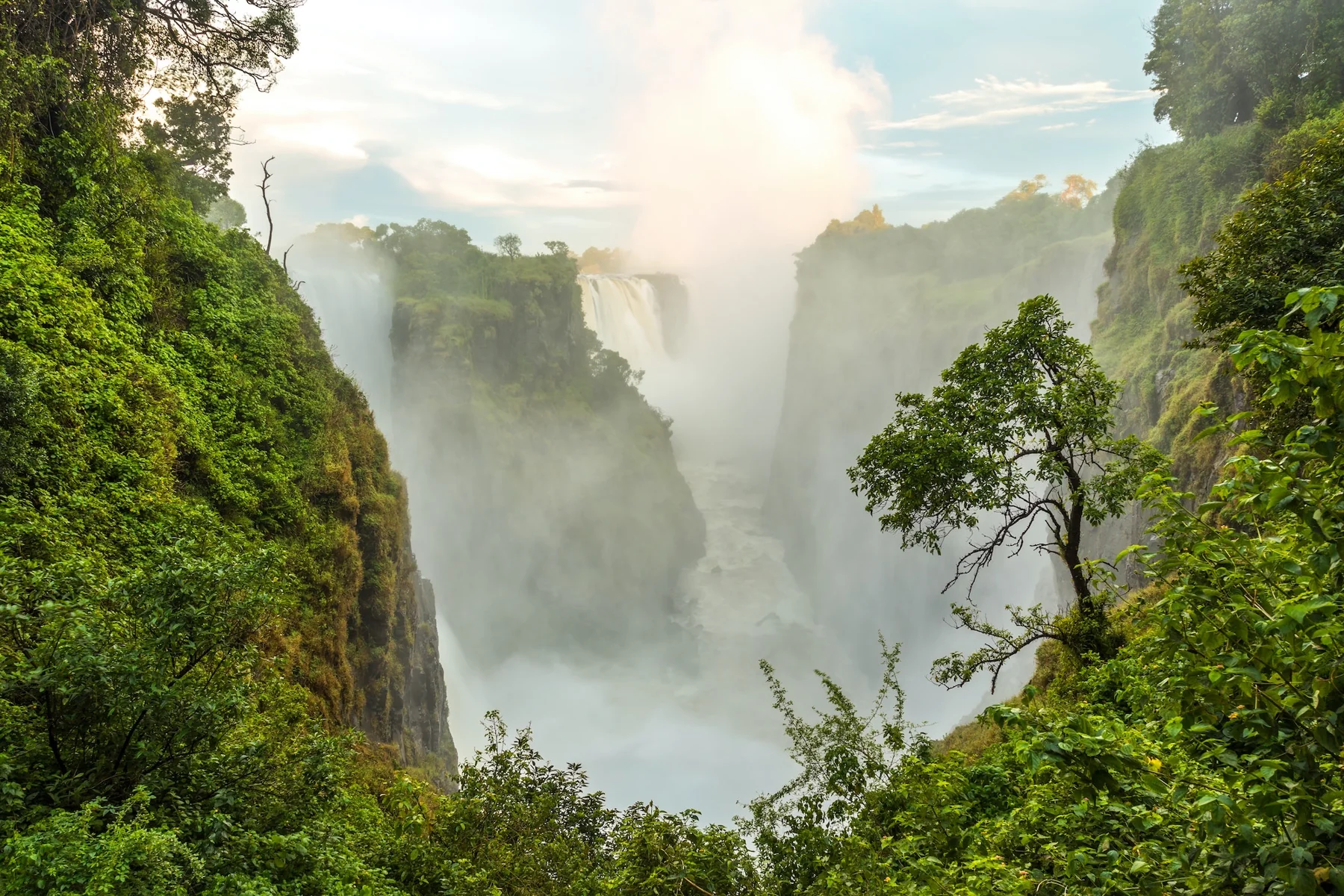 Victoria Falls and the green cliffs of the Zambezi gorge